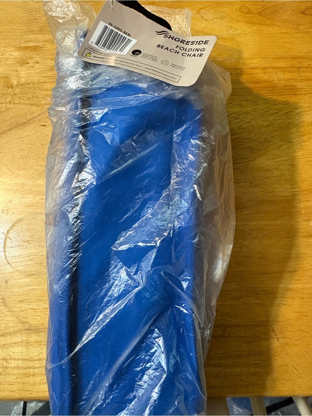 Shoreside Blue folding beach chair-new in original packaging.